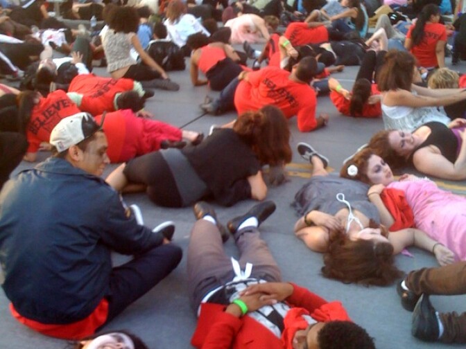 Dancers start on the ground and rise from the dead