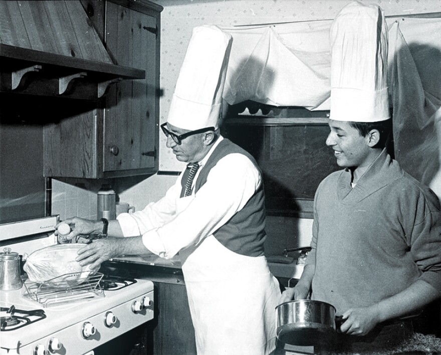 1964: John Cassidy and son, Cass, share cooking chores in their Chatsworth home