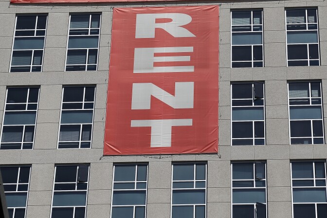 SAN FRANCISCO, CA - JUNE 15:  A large "rent" banner is posted on the side of an apartment building on June 15, 2012 in San Francisco, California.  According to a report by Harvard University's Joint Center for Housing Studies, the tepid real estate market could see a turnaround with the price of rental properties surging and vacancies dropping from 10.6 percent in 2009 to 9.5 percent last year, the lowest level since 2002.  (Photo by Justin Sullivan/Getty Images)