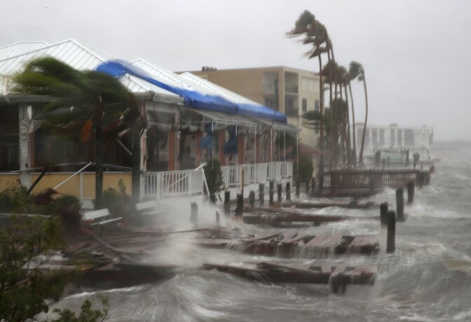 COCOA BEACH, FL - OCTOBER 07: Heavy waves caused by Hurricane Matthew pounds the boat docks at the Sunset Bar and Grill, October 7, 2016 on Cocoa Beach, Florida. Hurricane Matthew passed by offshore as a catagory 3 hurricane bringing heavy winds and minor flooding.  (Photo by Mark Wilson/Getty Images)