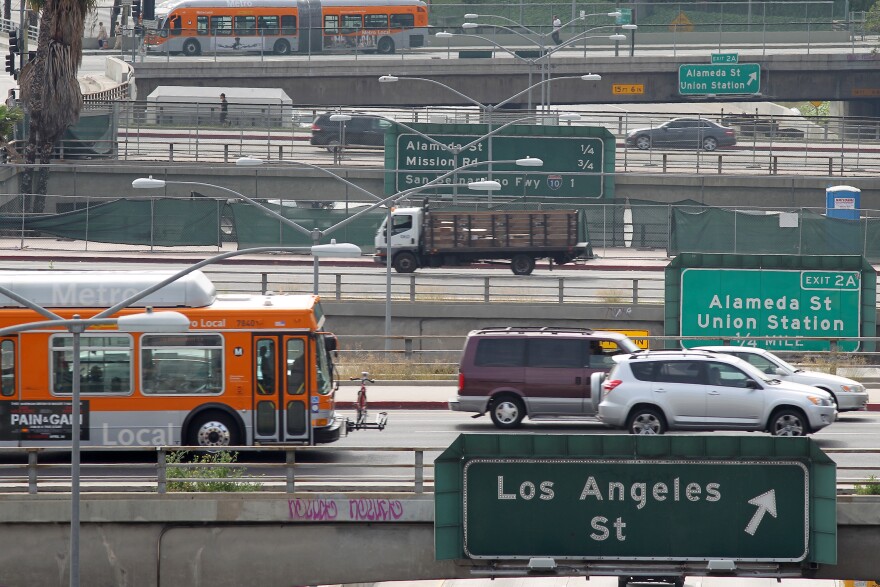 LOS ANGELES, CA - APRIL 25:  Surface street traffic corsses above the US 101 freeway on April 25, 2013 in Los Angeles, California. The nation's second largest city, Los Angeles, has again been ranked the worst in the nation for ozone pollution and fourth for particulates by the American Lung Association in it's annual air quality report card. Ozone is a component of smog that forms when sunlight reacts with hydrocarbon and nitrous oxide emissions. Particulates pollution includes substances like dust and soot.   (Photo by David McNew/Getty Images)