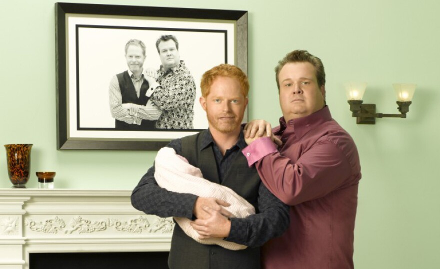A promotional image of Mitch and Cam from ABC's Modern Family.