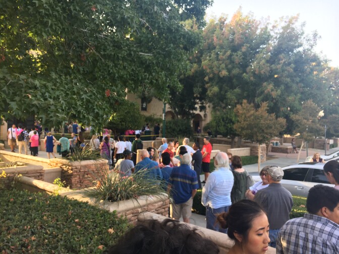 A line more than 200-people-deep snakes around the Palmdale Council Chamber ahead of a debate between Katie Hill and Rep. Steve Knight. No cameras or recordings were allowed.