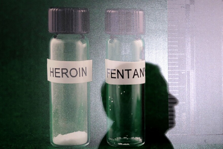 WASHINGTON, DC - MARCH 22:  The shadow of U.S. Sen. Lindsey Graham (R-SC) is cast on a photograph of heroin and fentanyl during a news conference  the U.S. Capitol March 22, 2018 in Washington, DC. In an attempt to fight America's opioid epidemic, Graham is introducing legislation that would increase the punishment for fentanyl distribution and trafficking.  (Photo by Chip Somodevilla/Getty Images)