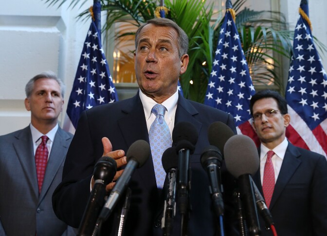 House Speaker John Boehner (R-OH) (C) speaks to the media while flanked by House Majority Leader Eric Cantor (R-VA) (R) and U.S.  Rep. Kevin McCarthy (R-CA) folowing a House Republican caucus meeting at the U.S. Capitol, October 15, 2013 in Washington, DC. With the government shutdown going into the fifttenth day and the deadline for raising the debt ceiling fast approaching, Democrats and Republicans may come to an agreement soon on passing a budget. 