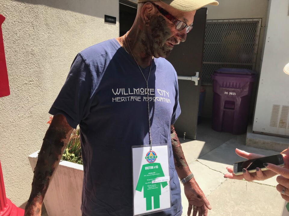 Ernie Villa with his completed Moulage fake third degree burns. Each volunteer has a victim card that gives lists their character’s physical problem, respiration and mental state. Photo credit: Audrey Alden