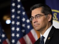 File: Then-Rep. Xavier Becerra (D-CA) listens during a news conference to discuss the rhetoric of presidential candidate Donald Trump, at the U.S. Capitol, May 11, 2016, in Washington, D.C.  