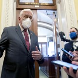 WASHINGTON, DC - JANUARY 11: House Majority Leader Steny Hoyer (D-MD) (L) wears a protective mask while speaking to reporters at the U.S. Capitol on January 11, 2021 in Washington, DC. House Republicans blocked Hoyers efforts to quickly move a resolution that urged Vice President Mike Pence to use the 25th amendment to remove President Donald Trump from office, setting up a vote on the measure tomorrow. (Photo by Stefani Reynolds/Getty Images)
