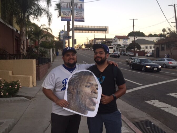 Dodgers fans Juan Lara & Mike Altier waited outside the stadium before Game 1 of World Series 2017.