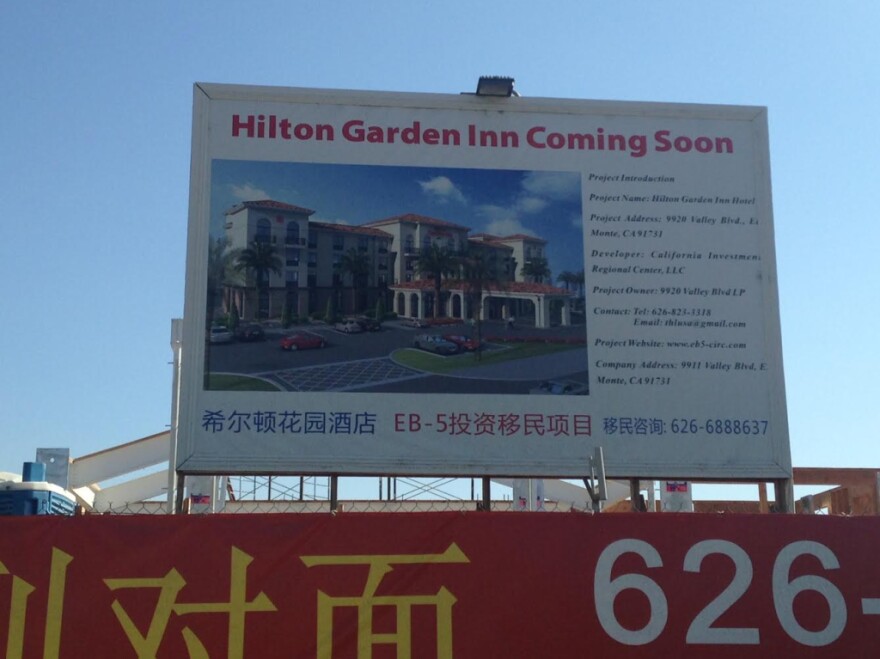 A poster for a hotel under construction in El Monte, financed using EB-5 investor funds. 
