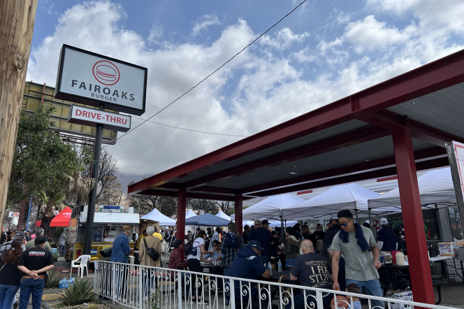 Altadenans gather at Fair Oaks Burger in Altadena for free food, supply distribution and an "Altadena Not For Sale" rally on Saturday March 29, 2025