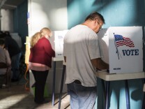 Voters cast their ballots at Echo Park Deep Pool in Los Angeles on Tuesday afternoon, Nov. 8, 2016.