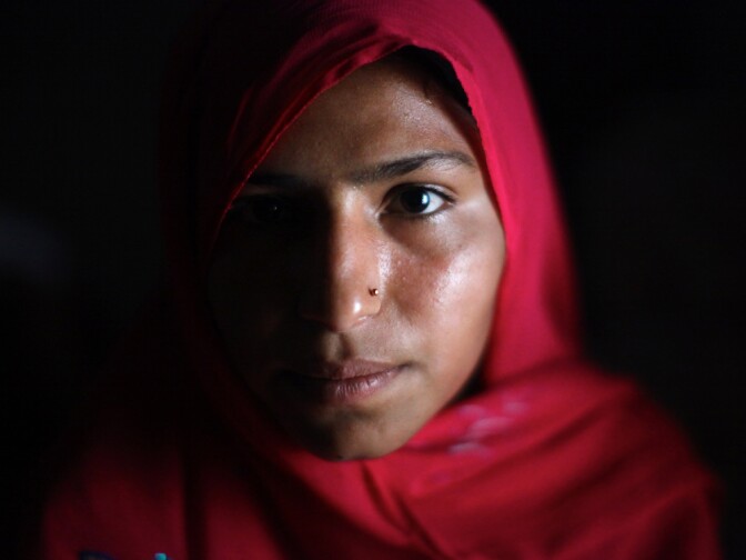 Kosar Ghaffar Ahmed, 17, participates in a literacy program in which students learn through transcribing text messages.