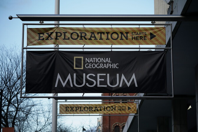 WASHINGTON, DC - DECEMBER 14:  The sign of The National Geographic Museum & Headquarters is seen December 14, 2017 in Washington, DC. Disney is acquiring most of 21st Century Fox, including Fox's movie studio and The National Geographic, for $52.4 billion.  (Photo by Alex Wong/Getty Images)