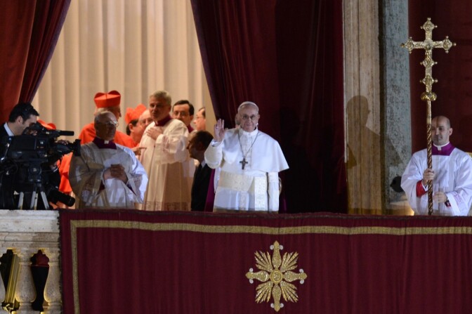 The new pope, Argentinian cardinal Jorge Mario Bergoglio, appears on the balcony of St Peter's Basilica after being elected the 266th pope of the Roman Catholic Church on March 13, 2013, at the Vatican.