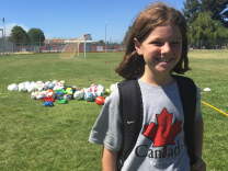 Erin Lee proudly sports her Vancouver, Canada T-shirt from the Women's World Cup during soccer camp at Cal State Northridge. 