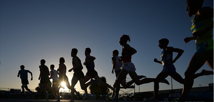 Apr 15, 2016; Norwalk, CA, USA; Silhouette of runners in the 1,500m in the 58th Mt. San Antonio College Relays at Cerritos College.