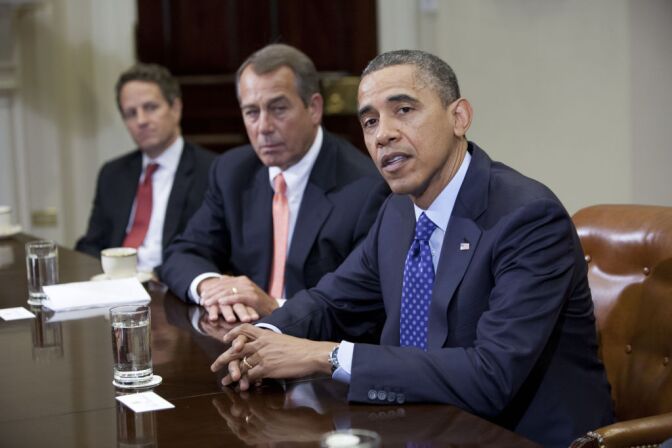US President Barack Obama speaks before Speaker John Boehner (R-OH) Secretary of the Treasury Timothy Geithner (3rdR) and other cabinet members during a meeting on November 16, 2012 in Washington,DC. Obama said Friday that Democrats and Republicans needed to make 'tough compromises' in order to overcome divisions over deficit reduction and avoid the fiscal cliff.