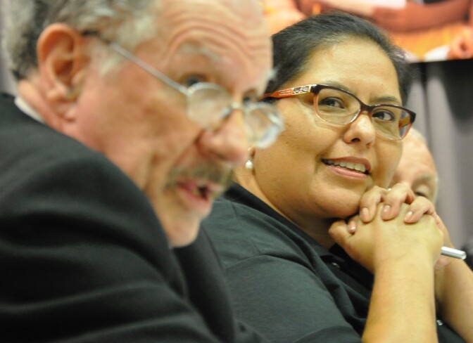 Los Angeles Unified School Board member Mónica García listens to fellow board member George McKenna speak during a meeting on Tues., Aug. 22, 2017.