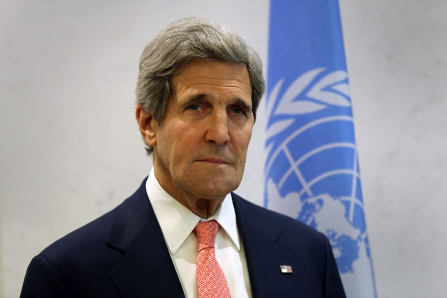 NEW YORK, NY - JULY 25:  U.S. Secretary of State John Kerry listens as UN Secretary General Ban Ki-moon speaks before a meeting of the UN Security Council on July 25, 2013 in New York City. At the meeting Kerry expressed American support for the the Secretary General's Peace, Security and Cooperation Framework for the Democratic Republic of the Congo and the region.  (Photo by John Moore/Getty Images)