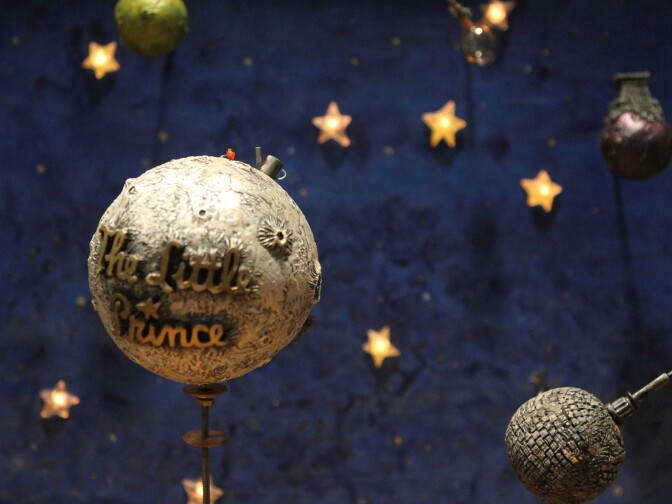 Inside the "magic suitcase" used for pitching "The Little Prince." The stars light up as the suitcase is opened and planets like this asteroid pop up. 