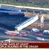 Three cars of a Southern California Metrolink commuter train have derailed and tumbled onto their sides after a collision with a truck on tracks in Ventura County northwest of Los Angeles.
