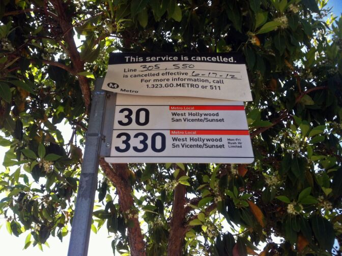 This sign lets people know about the 305 bus line being discontinued as part of widespread service changes by L.A. Metro.