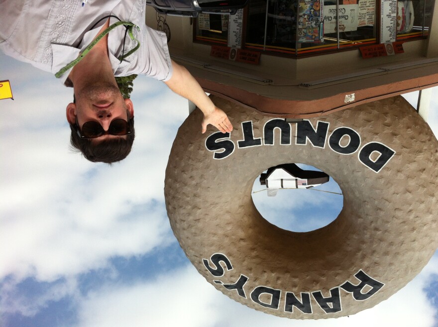 Off-Ramp host John Rabe along the Endeavour parade route in South LA.