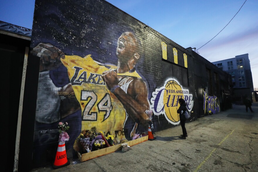 LOS ANGELES, CALIFORNIA - FEBRUARY 13: A mural depicting deceased NBA star Kobe Bryant, painted by Jonas Never, is displayed on a building on February 13, 2020 in Los Angeles, California. Numerous murals depicting Bryant and Gianna have been created around greater Los Angeles following their tragic deaths in a helicopter crash which left a total of nine dead. A public memorial service honoring Bryant will be held February 24 at the Staples Center in Los Angeles, where Bryant played most of his career with the Los Angeles Lakers.  (Photo by Mario Tama/Getty Images)