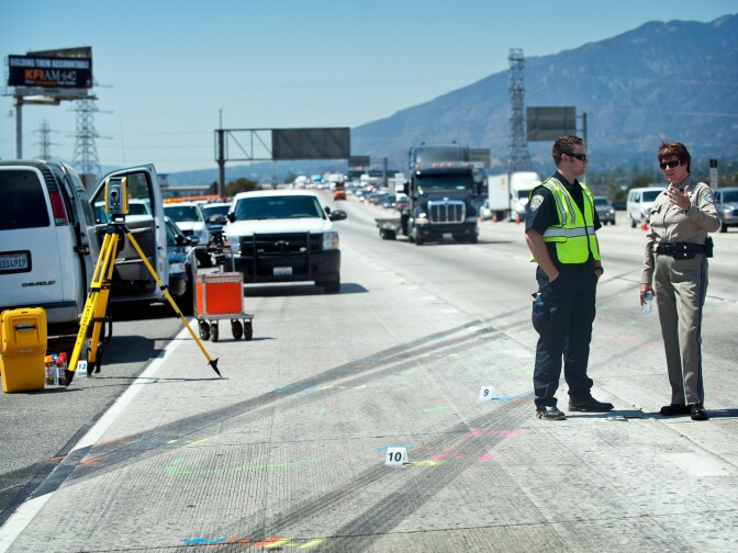 The skid marks lead from the #1 lane and cut across the highway to the right shoulder. More than 50 were injured when a charter bus overturned on the 210 East in Irwindale on Thursday morning, Aug. 22.