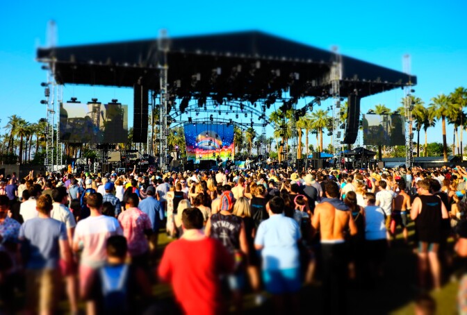 INDIO, CA - APRIL 12:  (EDITORS NOTE: Image was processed using Digital Filters) Music fans attend day 3 of the 2015 Coachella Valley Music & Arts Festival (Weekend 1) at The Empire Polo Club on April 12, 2015 in Indio, California.  (Photo by Frazer Harrison/Getty Images for Coachella)