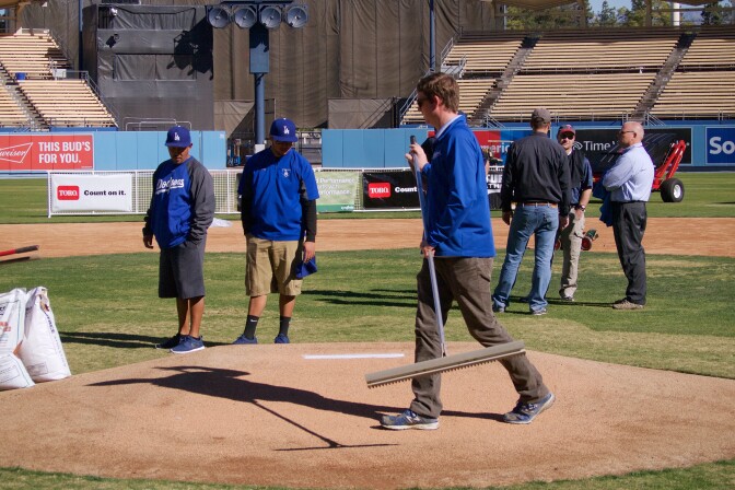 Dodgers employees, high school coaches and local parks groundskeepers learned ways to maintain everything: from outfield grass to pitcher's mounds. 