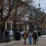 BERLIN, GERMANY - NOVEMBER 19: Visitors walk in boulevard Unter den Linden in the city center during the second wave of the coronavirus pandemic on November 19, 2020 in Berlin, Germany. Berlin is gearing up for the Christmas holiday season, albeit without the traditional annual Christmas markets, which have been cancelled due to pandemic. Germany is currently in a November semi-lockdown as authorities seek to rein in daily infection rates that have spiralled to record highs in recent weeks. (Photo by Maja Hitij/Getty Images)