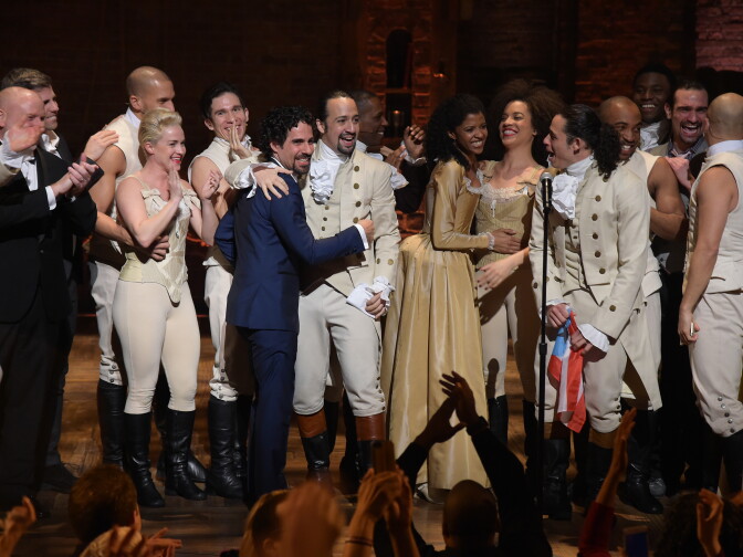 NEW YORK, NY - FEBRUARY 15:  Music director Alex Lacamoire and actor, composer Lin-Manuel Miranda and cast of "Hamilton" celebrate on stage the receiving of GRAMMY award after "Hamilton" GRAMMY performance for The 58th GRAMMY Awards at Richard Rodgers Theater on February 15, 2016 in New York City.  (Photo by Theo Wargo/Getty Images)