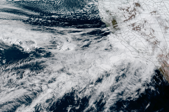 A satellite image of an atmospheric river – in the form of clouds – running into California.