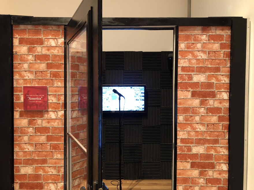 A singing booth dedicated to West Side Story, where visitors can sing along to 'America.'