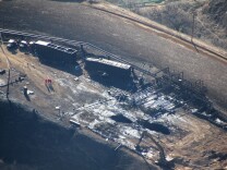 Overhead photos show the leaking Aliso Canyon well pad near the Porter Ranch community on Dec. 17, 2015.