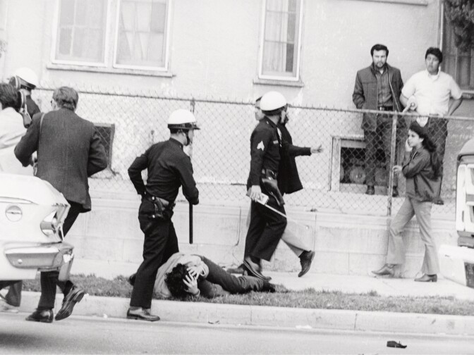 Boyle Heights, 1968. "Some kid got hit on the head by the cops during the Walkouts. I called these images 'a field day for the heat.' They were just kids."