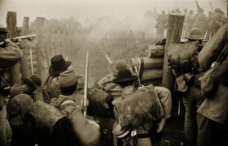 Confederate troops attempt to hold off Union soldiers breaching the trenches at the Battle of Spotsylvania in Virginia.