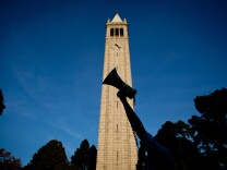 BERKELEY - NOVEMBER 15: University of California, Berkeley students march through campus as part of an "open university" strike in solidarity with the Occupy Wall Street movement November 15, 2011 in Berkeley, California.  Teach-outs, workshops, public readings, and marches will culminate in an attempt to re-establish an Occupy Cal encampment that was shut down by police last week. (Photo by Max Whittaker/Getty Images)