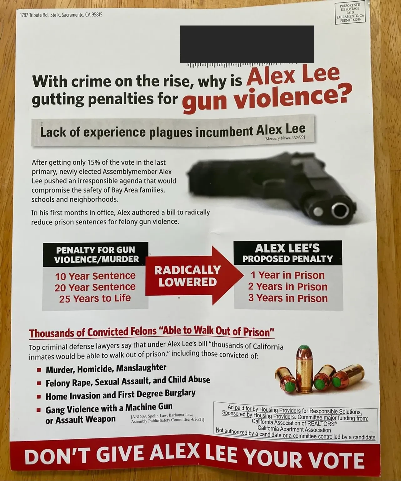 A campaign flyer shows a gun and bullet, with large font up top reading: With crime on the rise, why is Alex Lee gutting penalties for gun violence?