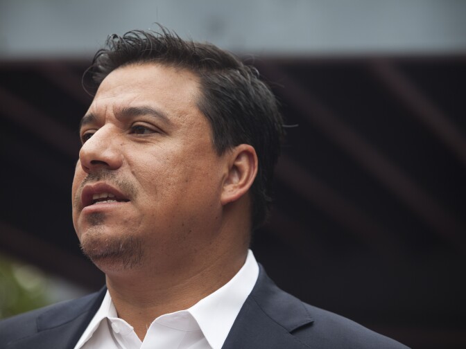 Los Angeles City Council member Jose Huizar leads a press conference about the Operation Healthy Streets initiative at the Volunteers of America building near Skid Row.