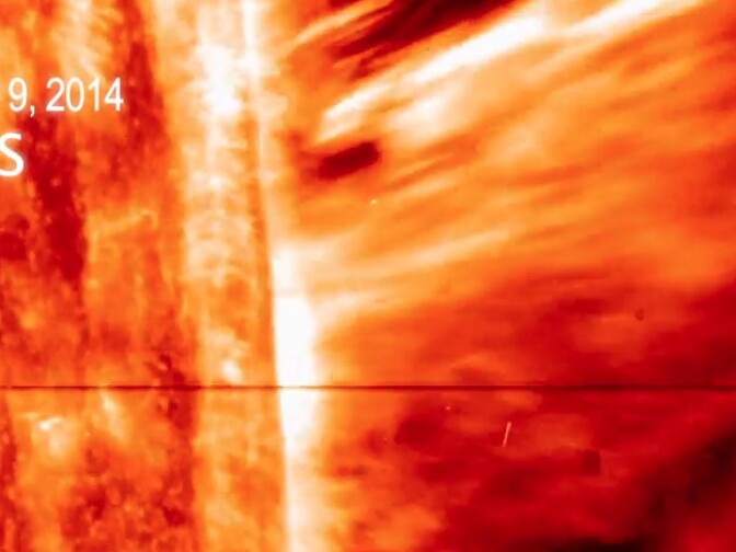 Image of a massive solar flare captured on video by NASA's new IRIS satellite. 