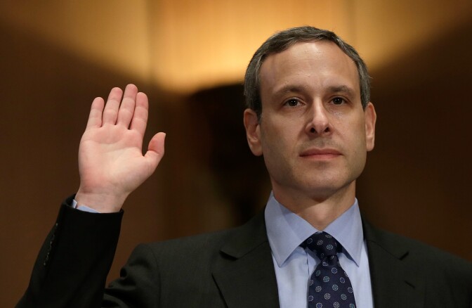 Former IRS Commissioner Douglas Shulman is sworn in prior to testifying before the Senate Finance Committee May 21, 2013 in Washington, DC. The committee heard testimony on the topic of on "A Review of Criteria Used by the IRS to Identify 501(c)(4) Applications for Greater Scrutiny." 