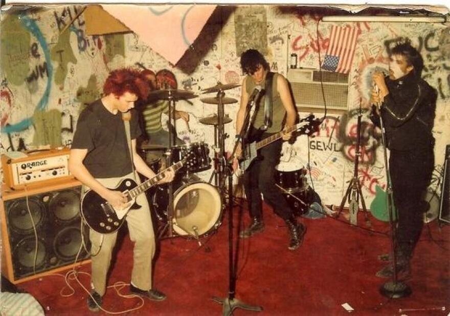 An early photograph of TSOL rehearsal.