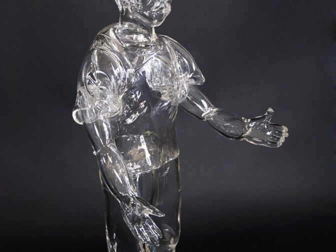 Glass piñata and child from the Broken Dreams installation