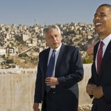 US Democratic presidental candidate Barack Obama (R) shares a laugh with US Senator Chuck Hagel R-Neb., as they tour the Citadel on July 22 2008, with the hillsides of Amman in the background. Illinois Senator Obama continues his tour across the Middle East and then on to Europe. US Senator Jack Reed D-R.I., is obscured in the center.  AFP Photo/Paul J. Richards (Photo credit should read PAUL J. RICHARDS/AFP/Getty Images)