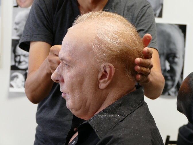Make up artist Kazuhiro Tsuji works on Gary Oldman's prosthetics on the set of director Joe Wright's DARKEST HOUR, a Focus Features release