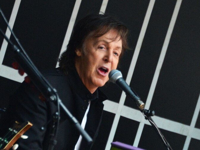 Sir Paul McCartney performs at Times Square on October 10, 2013 in New York City. 