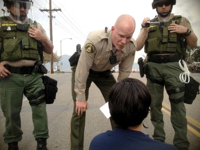 Riverside County sheriff’s deputies warn 6 protesters they will be arrested unless they clear roadway outside Walmart-affiliated NFI Industries in Mira Loma Thursday. Workers say they’re being retaliated against for demanding basic improvements. 